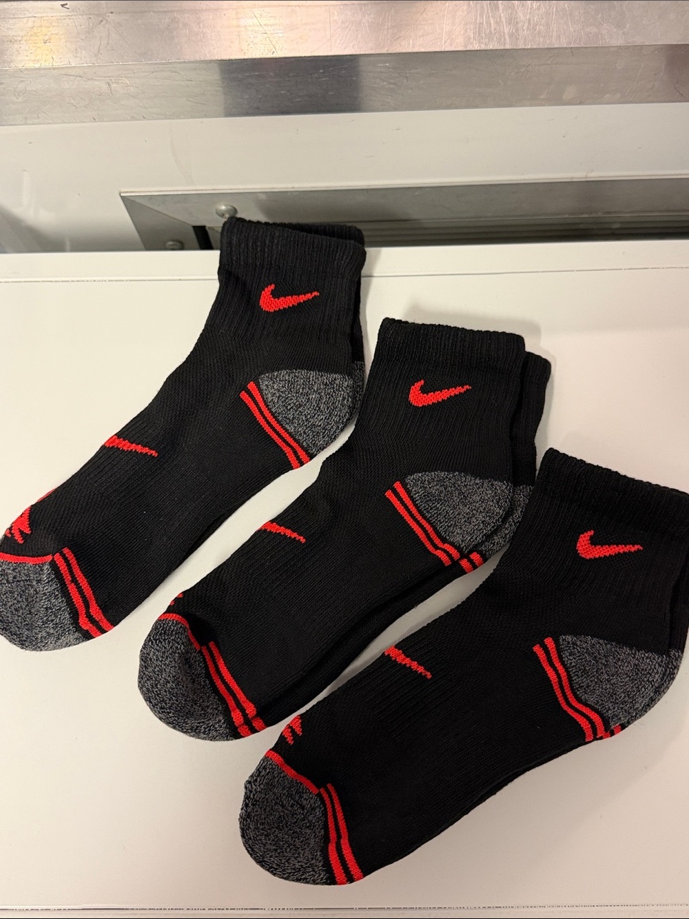 Nike Black Athletic Socks with Red Accents